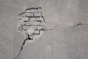 cracked stucco in need of repair by amazing stucco inc